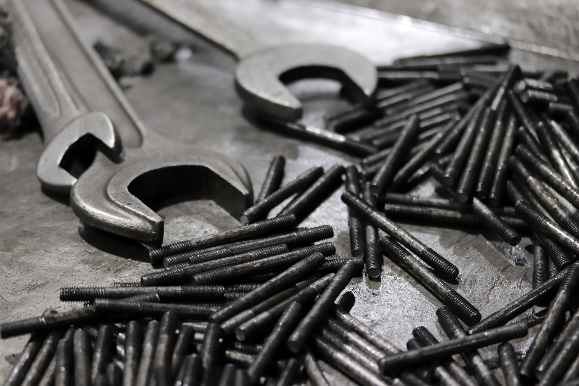 Wrench and screws.